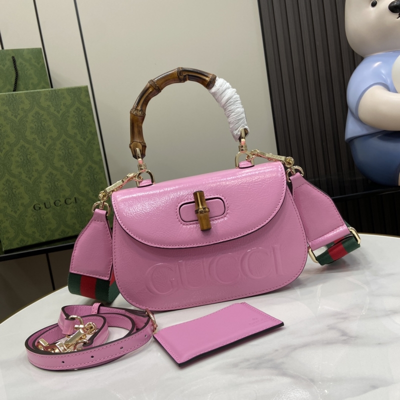 G*u*i top handle bags